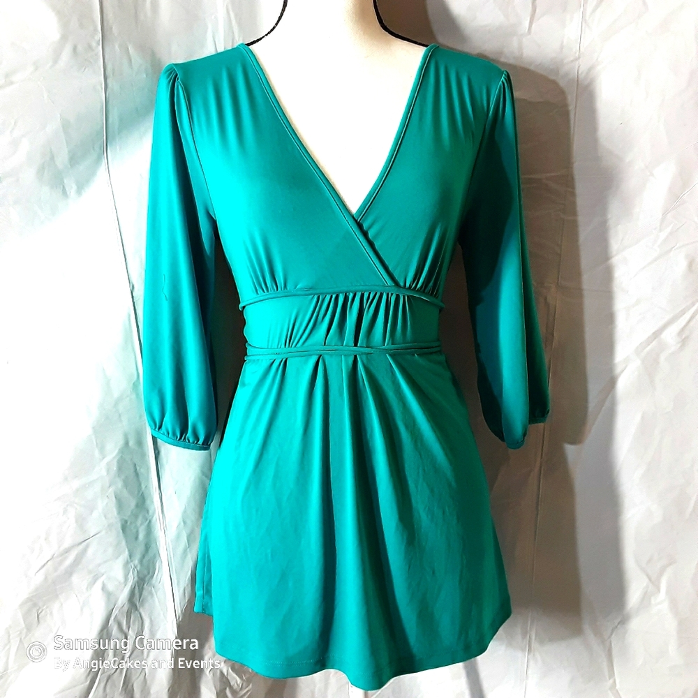 Miss bison medium tie bag V neck blouse